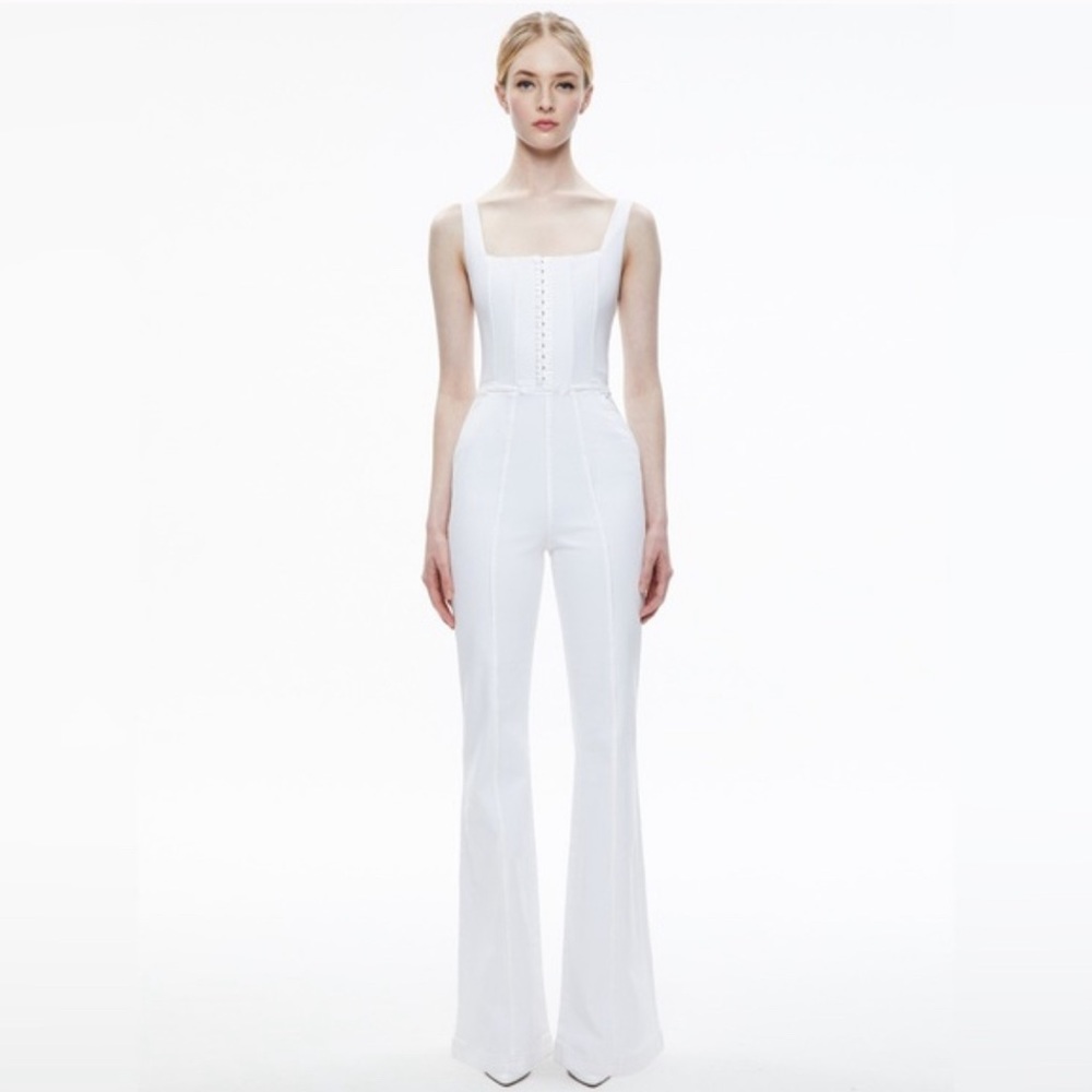 Alice and Olivia White Denim Jumpsuit. This is a size 29. Like New worn once